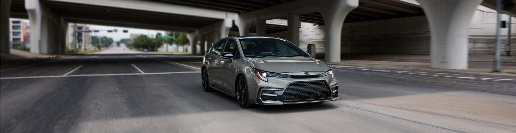 Toyota Corolla Under Bridge