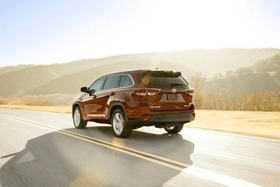 Red Toyota SUV Driving - Phillips Toyota, Serving The Villages in Florida